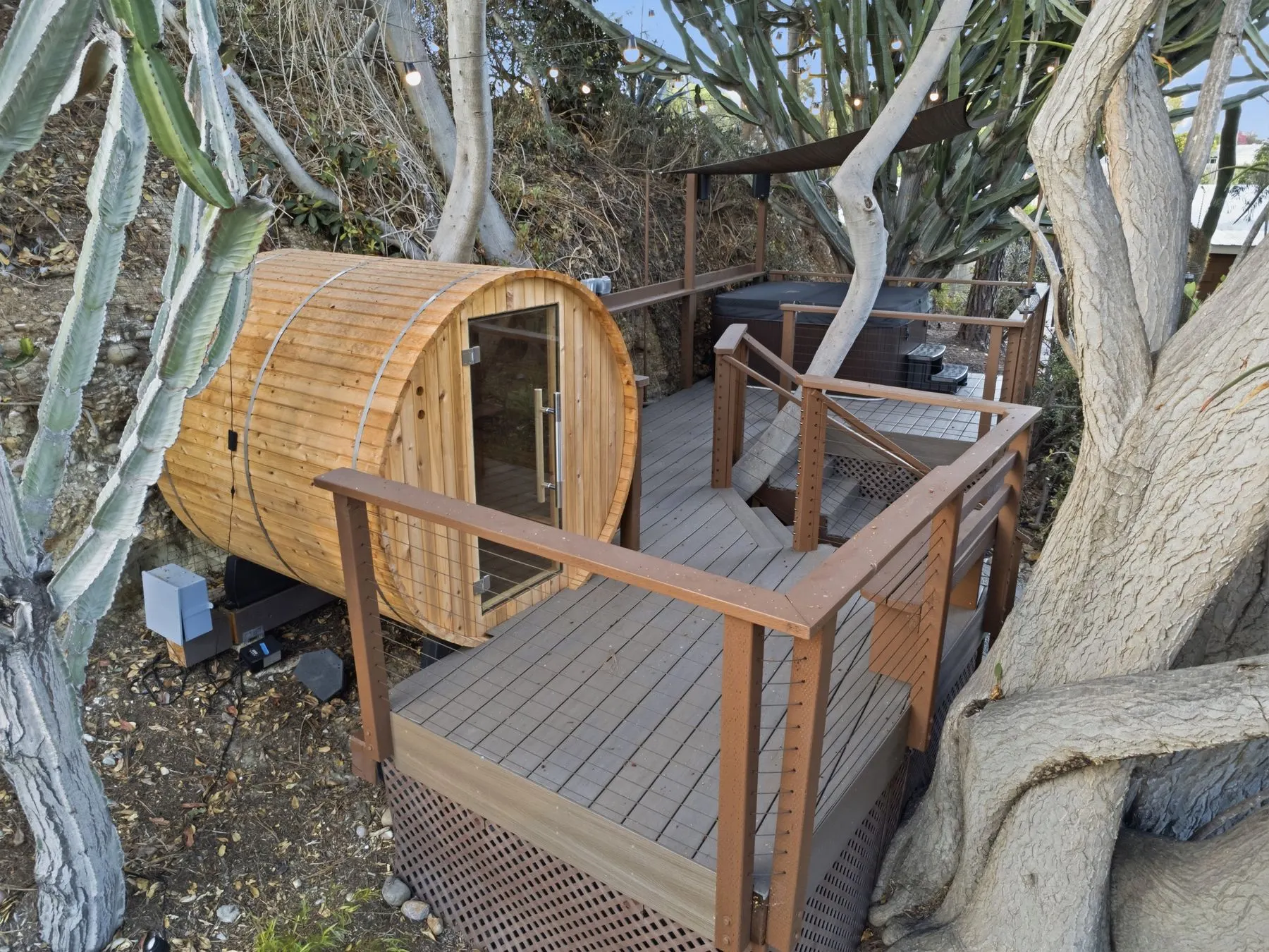 Cedar barrel sauna on the raised deck