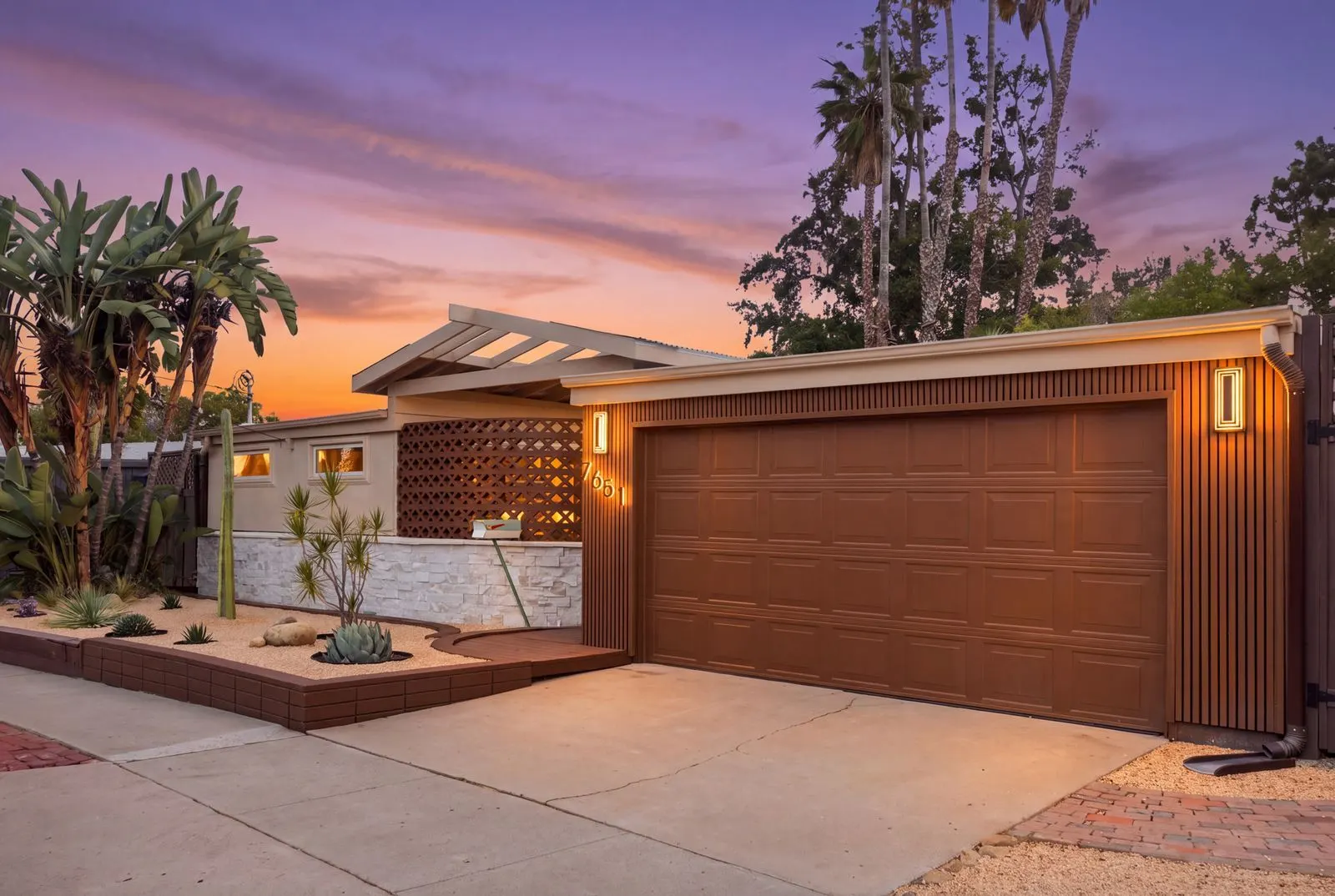 The midcentury front of the house at dusk