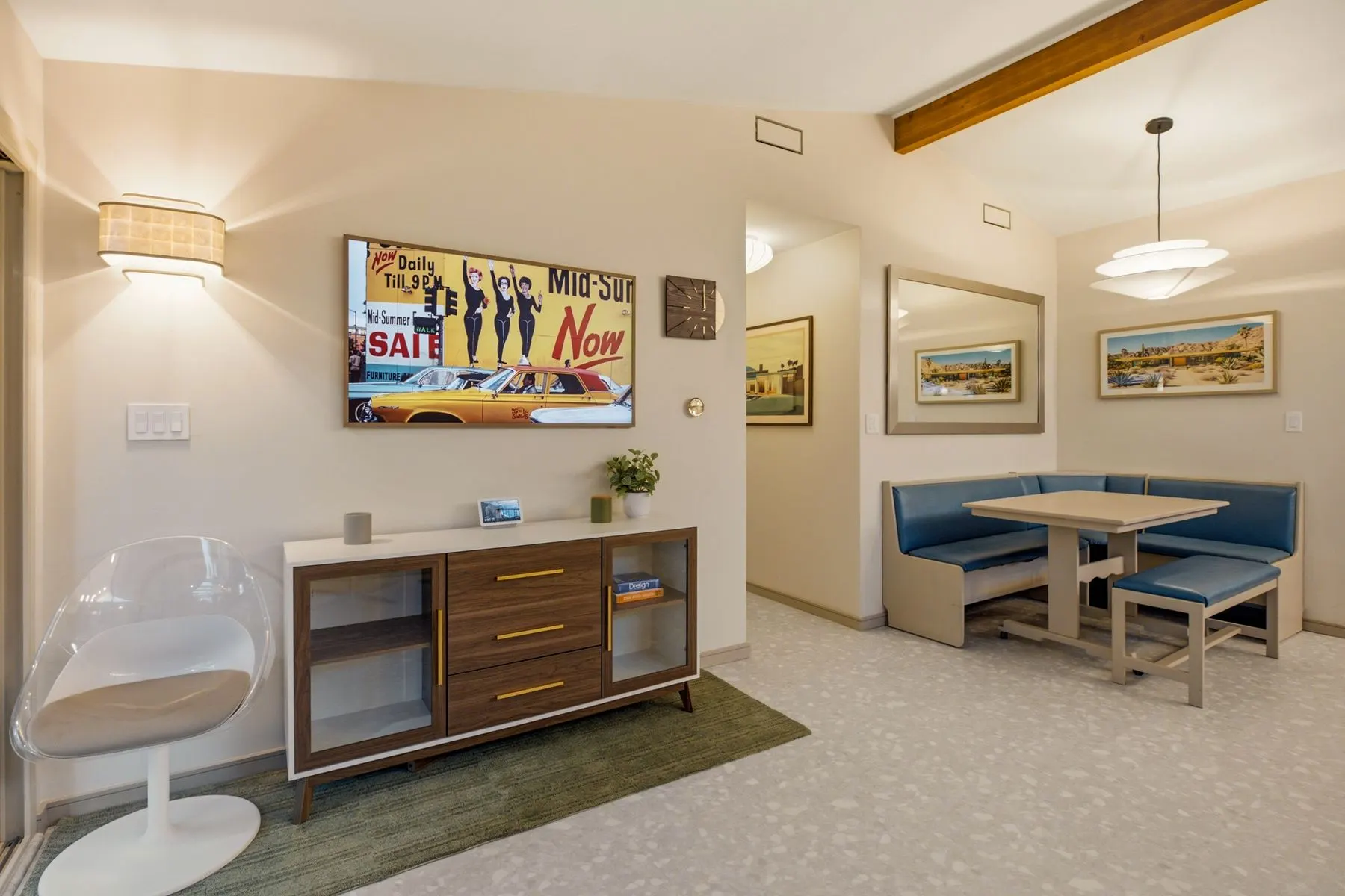 55" Samsung Frame TV (streaming + AirPlay), with the breakfast nook beyond